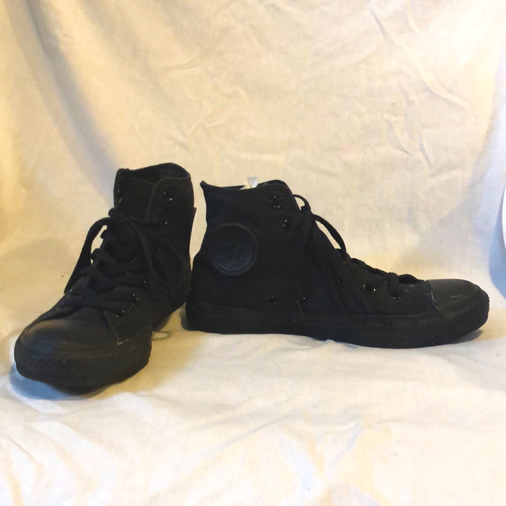 All black Converse high tops